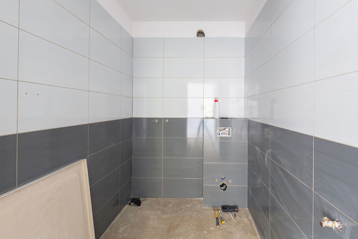 New tiles in bathroom interior